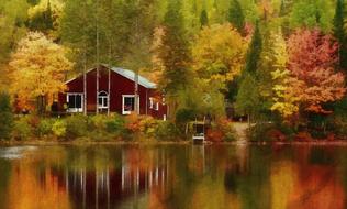 village house on riverside at fall