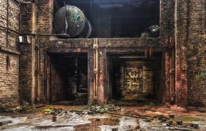 Colorful, old factory hall in light and shadow