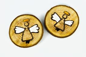 symbols of angels on wooden planks