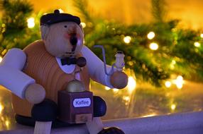 Christmas toy with a pipe and a coffee grinder