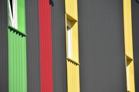 colorful stripes on an industrial building