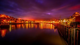 panoramic view of Whitby Harbor at night