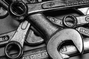 black and white photo of wrenches