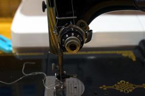 sharp needle of a sewing machine