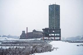 landscape of abandoned buildings at winter