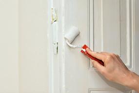 working painter with roller