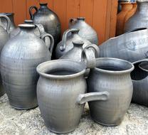 Beautiful, shiny, gray Siwaki pottery, near the wooden wall