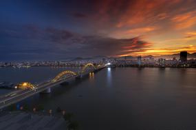 distant view of the bridge at dusk in vietnam