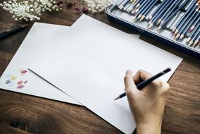 artist and white paper