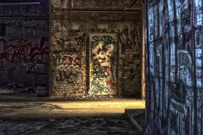 graffiti on the walls in an abandoned building