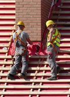Man Roofers