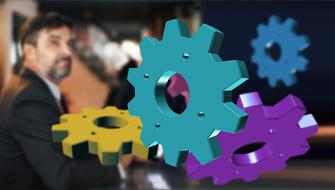 Businessman behind Gears banner
