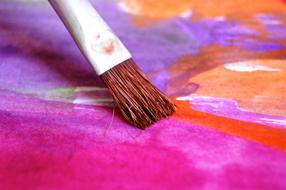 painting with a brush and watercolors