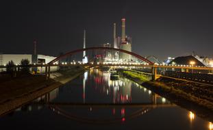 scenic industrial night skyline with Bridge across Water, germany, mannheim