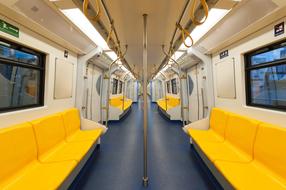 yellow seats in a subway car, Bangkok