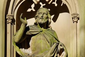stone figure of Jesus Christ in a cemetery