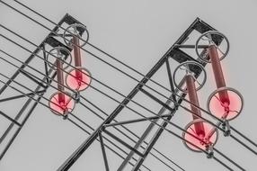 Close-up of the steel structure with the cables with electricity and red circles