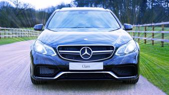 Mercedes Car on road in countryside