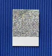 colored sheet of paper on a blue background