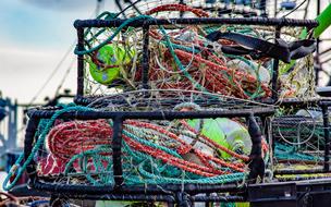 pile of Fishing Nets with colorful ropes