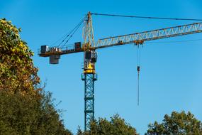 crane at a construction site among nature