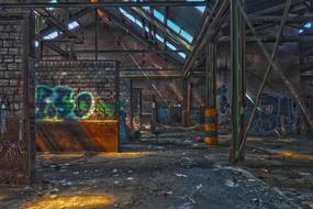 Beautiful and colorful, old, abandoned factory with colorful graffities, in light