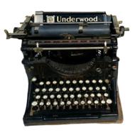 vintage Underwood typewriter on a white background