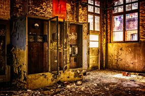 broken electrical cabinets in an abandoned building