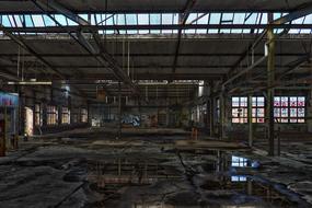 Landscape of the old, abandoned building with windows, and water inside