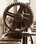 Retro photo with the close-up of a mechanic gear