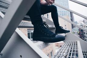 Guy shoes on stairs