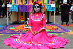 woman in traditional dress in Mexican festival