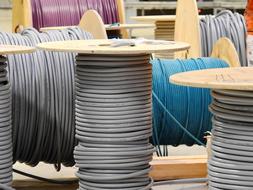 Colorful cables on the cable drums