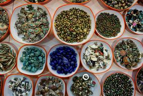 Beautiful and colorful jewellery in the bowls, at the Grand Bazaar in Ä°stanbul, Turkey