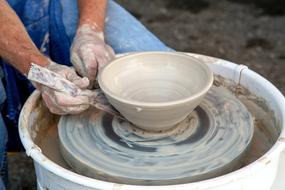 man making Clay Potter Wheel