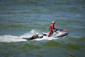 Rescuers Sea Exercise on the waves on a sunny day