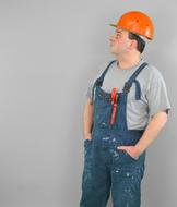 young man watching at wall, Worker