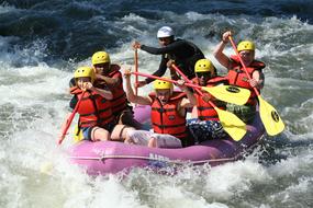 team in rafting boat