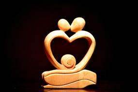 couple kissing, wooden Sculpture