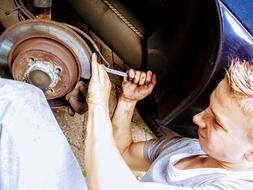 Man changing car pads