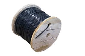 Black, shiny electric cable on the coil, at white background