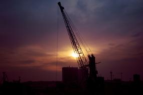 boom of Crane at sunset sky, slovakia, bratislava
