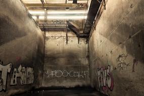 windowless room in an abandoned industrial building