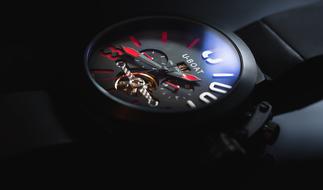 macro photo of black waterproof watch