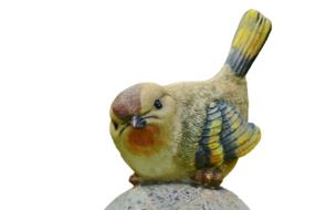 sculpture of a tit on a stone ball