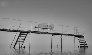 bench on the pier in monochrome