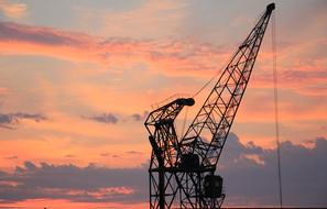 harbor crane at sunset