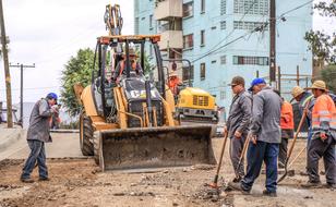 road builders on city street