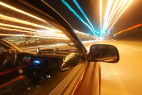 Acceleration, auto speeding on highway at night