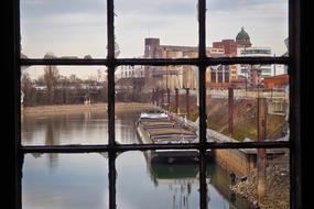 river view through the window of an abandoned building